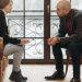 A thought-provoking therapy session with therapist and client discussing in a cozy room.